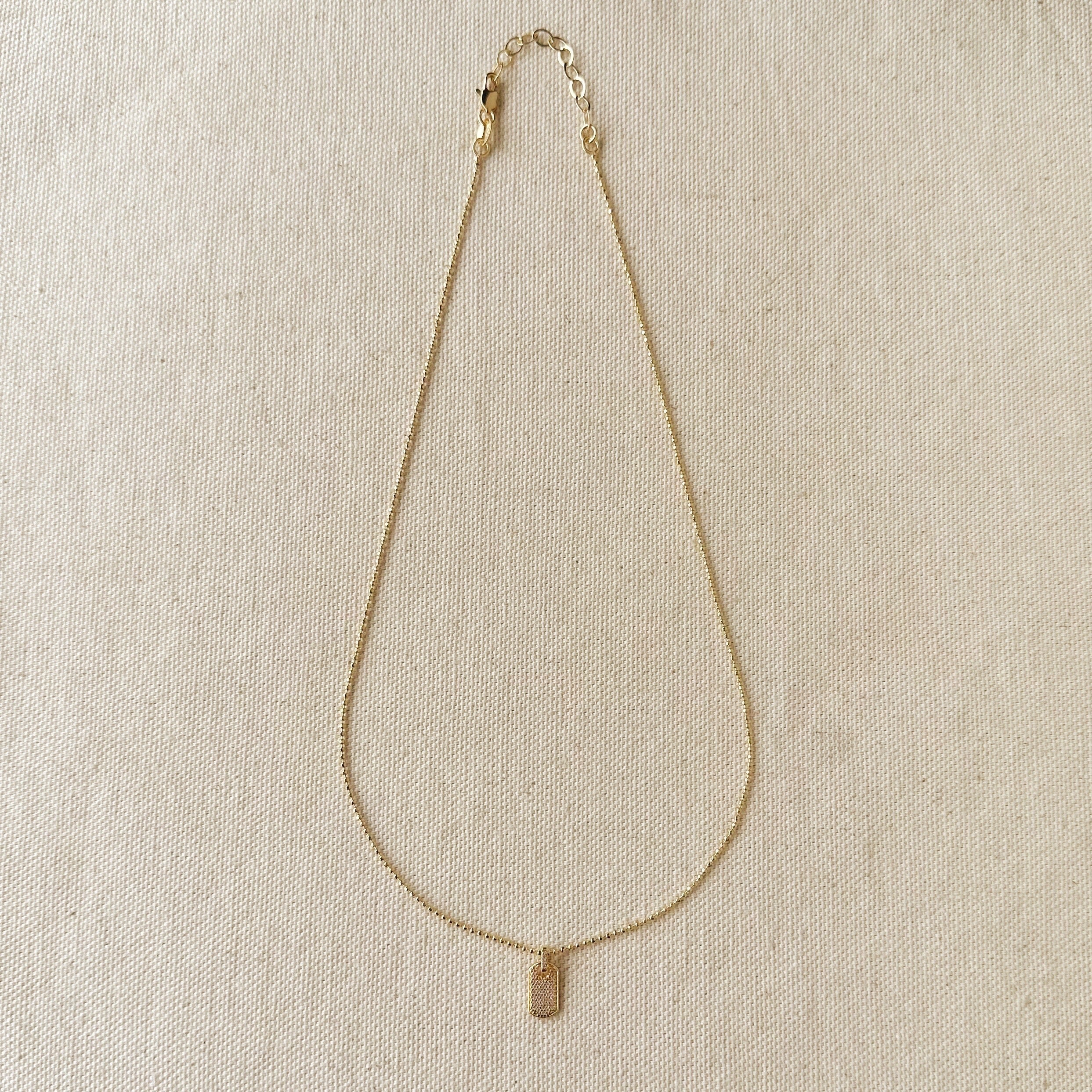 Mondsee Mini Dog Tag Necklace Featuring Micro Cubic Zirconia Stones | 18k Gold Filled Jewelry