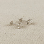 .925 Sterling Silver Rhodium Plated Moissanite Baguette Stud Earrings