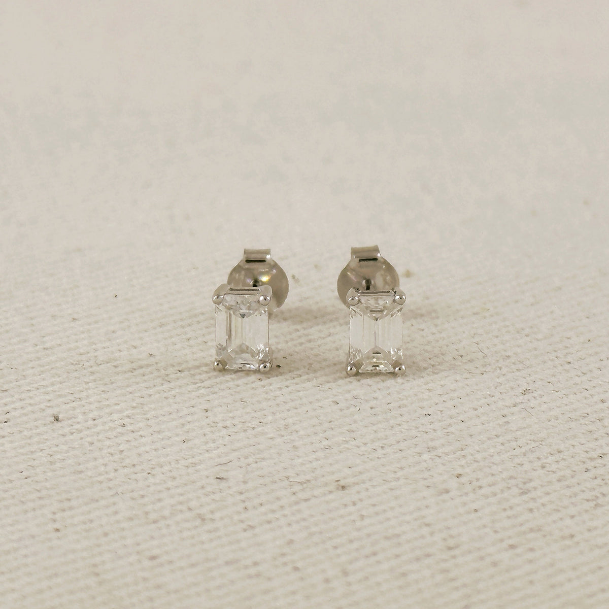 .925 Sterling Silver Rhodium Plated Moissanite Baguette Stud Earrings