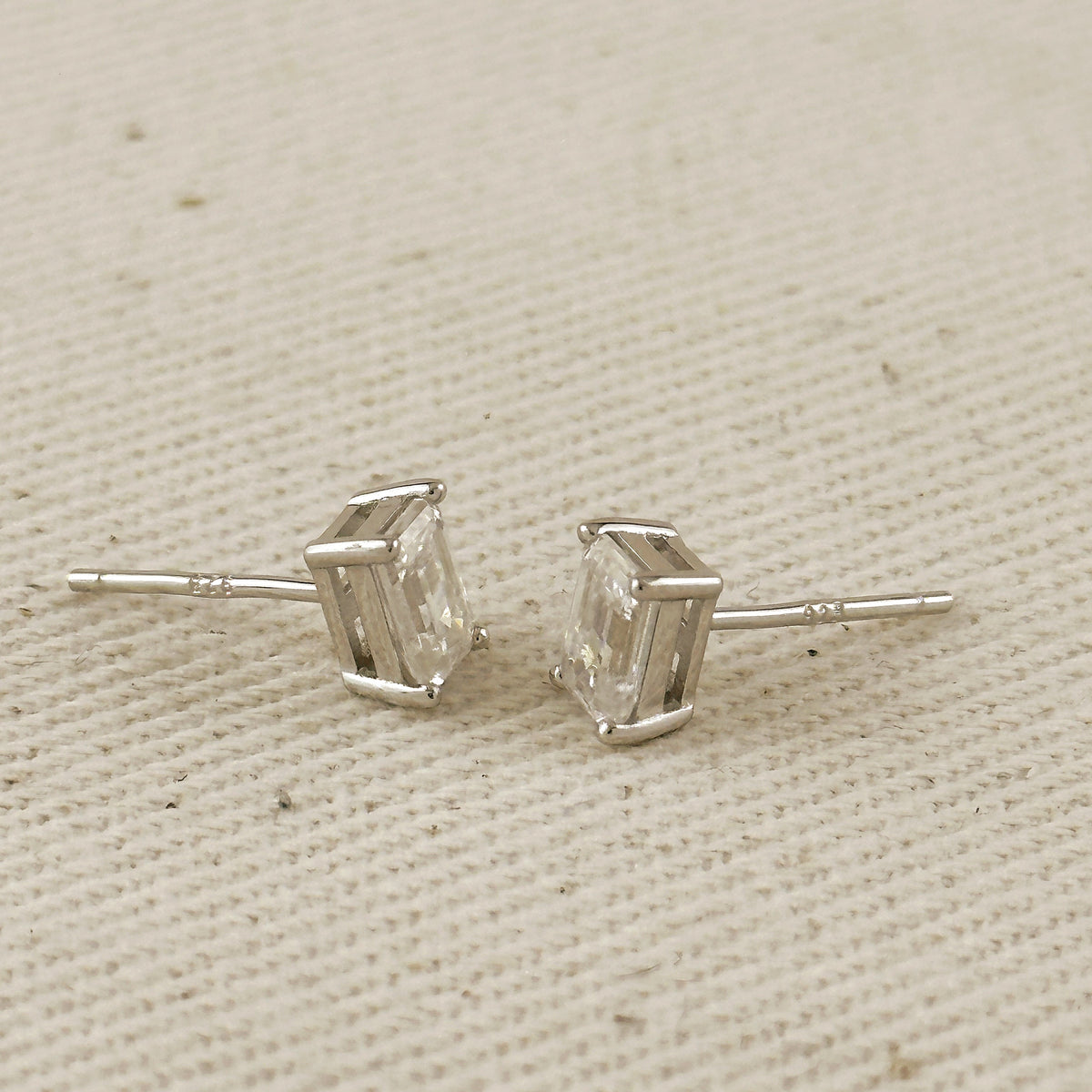 .925 Sterling Silver Rhodium Plated Moissanite Baguette Stud Earrings