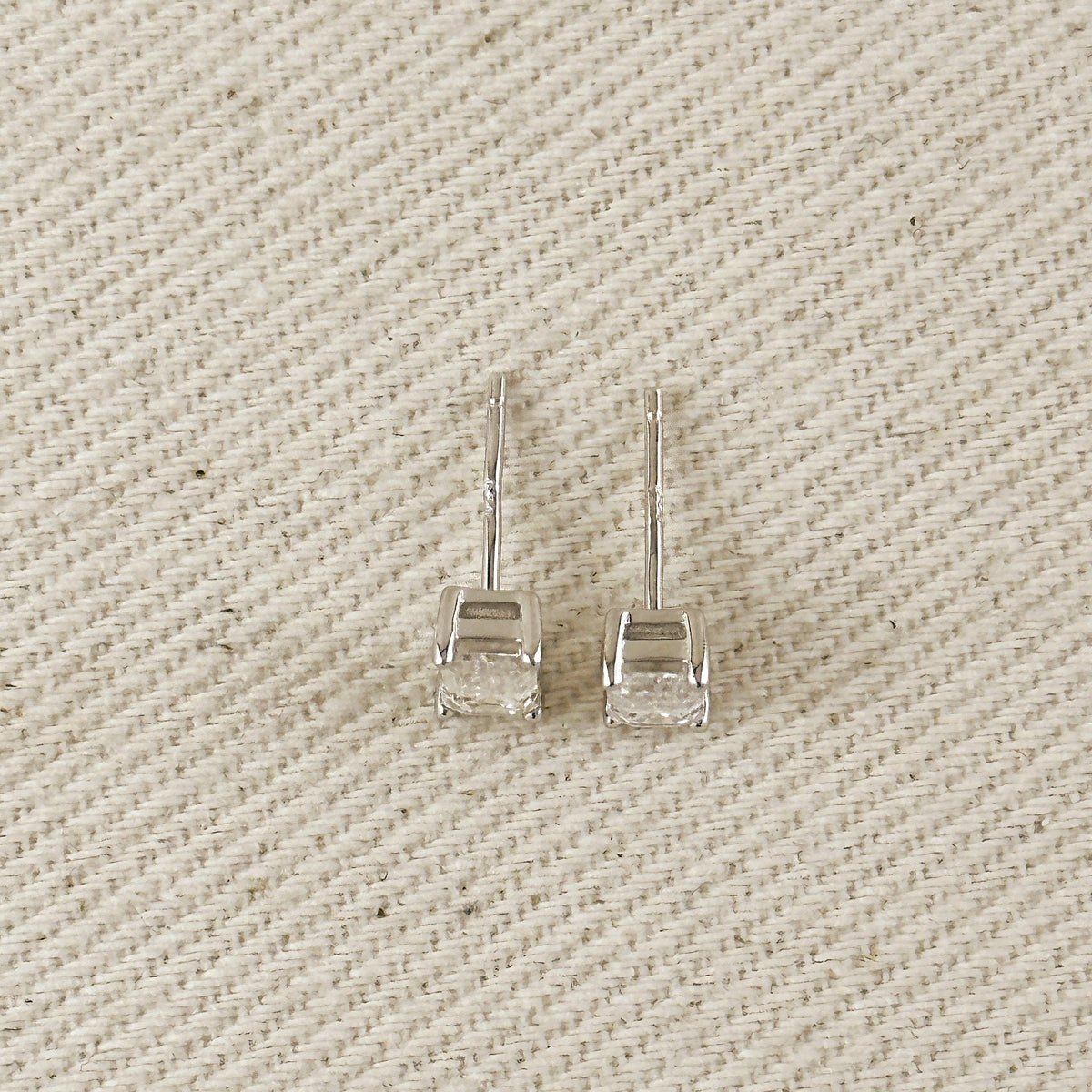 .925 Sterling Silver Rhodium Plated Moissanite Baguette Stud Earrings